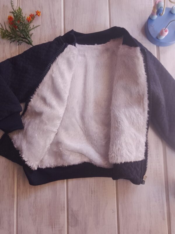 Imagen de WhatsApp 2025-09-11 a las 16.55.56_42862da7 Campera de Paño Forrada con Polar Unisex